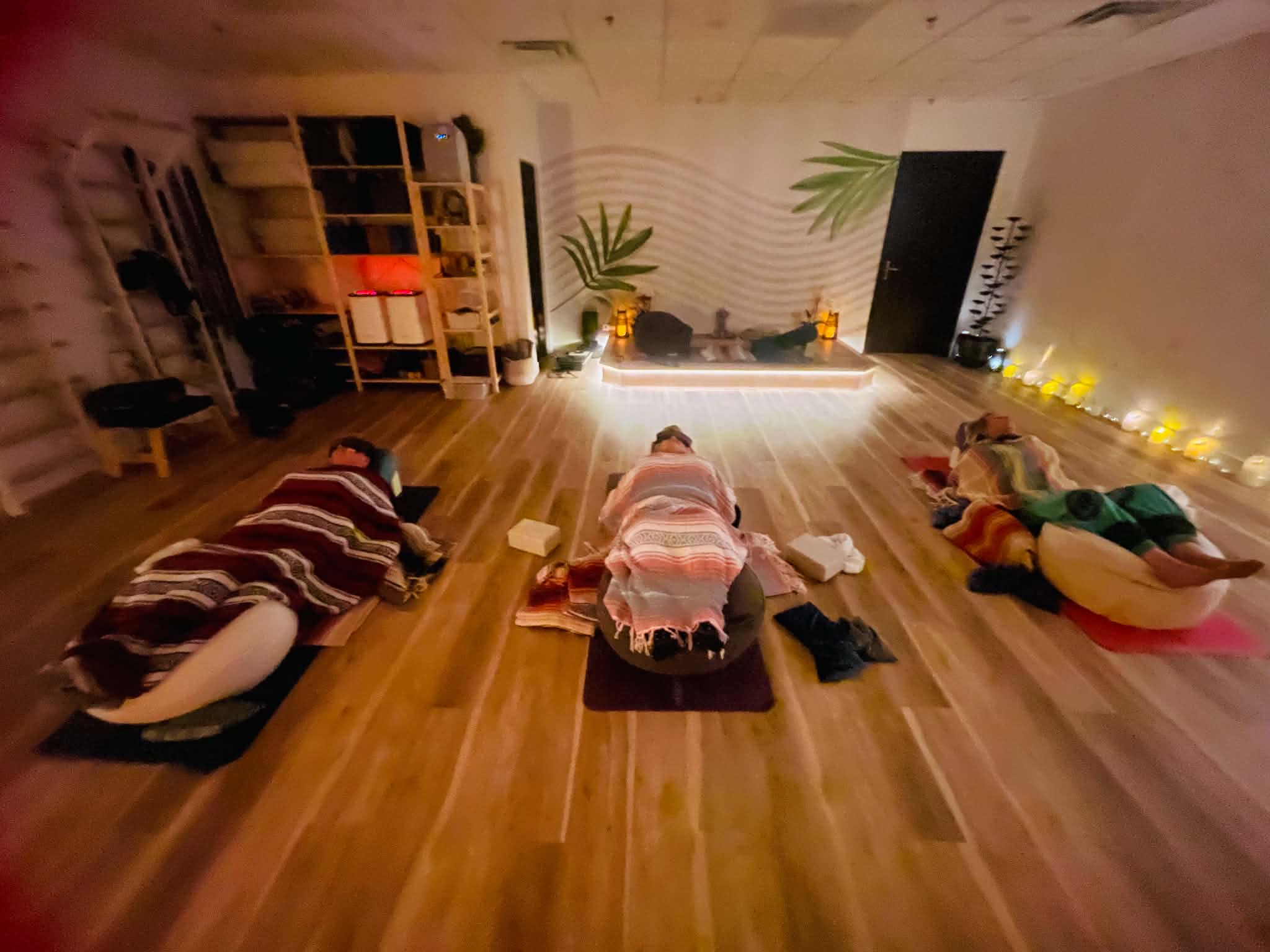 Seated meditation class by candlelight
